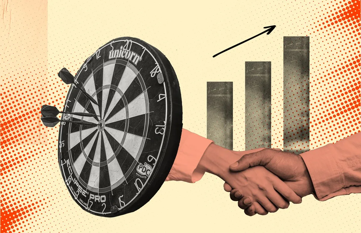 Two people shaking hands over a target, illustrating a growth partnership